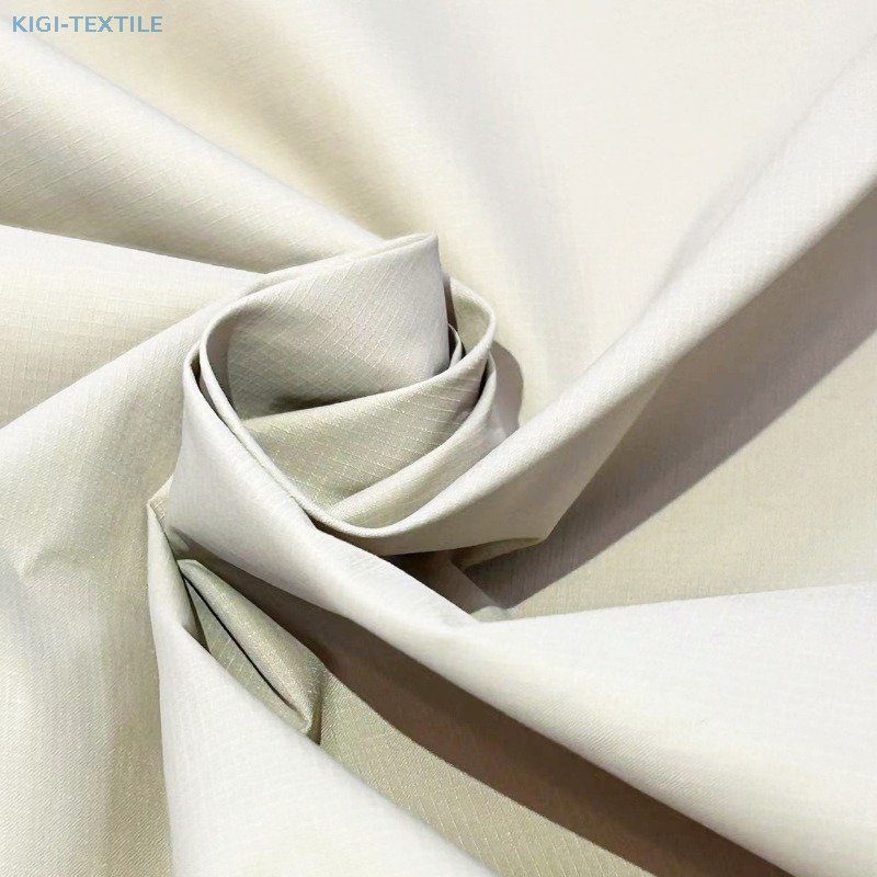 15D 450T Recycled Nylon Grid Ripstop Down-Proof Fabric for Down Jacket — product image 1