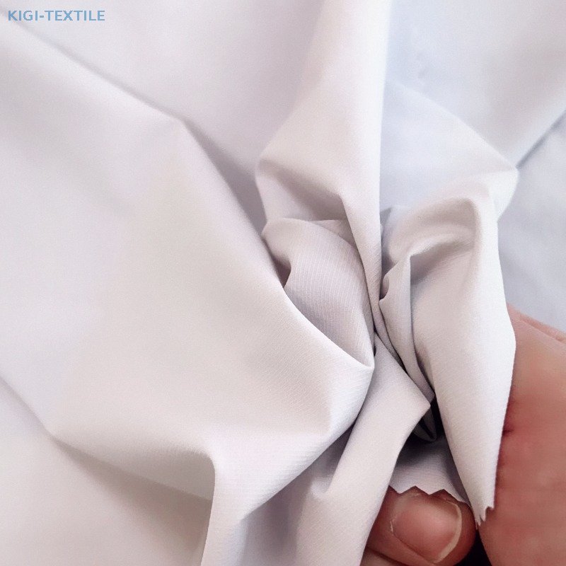 30D Nylon Spandex UPF100+ Cool Feeling Breathable Ripstop Fabric with Grid — product image 1